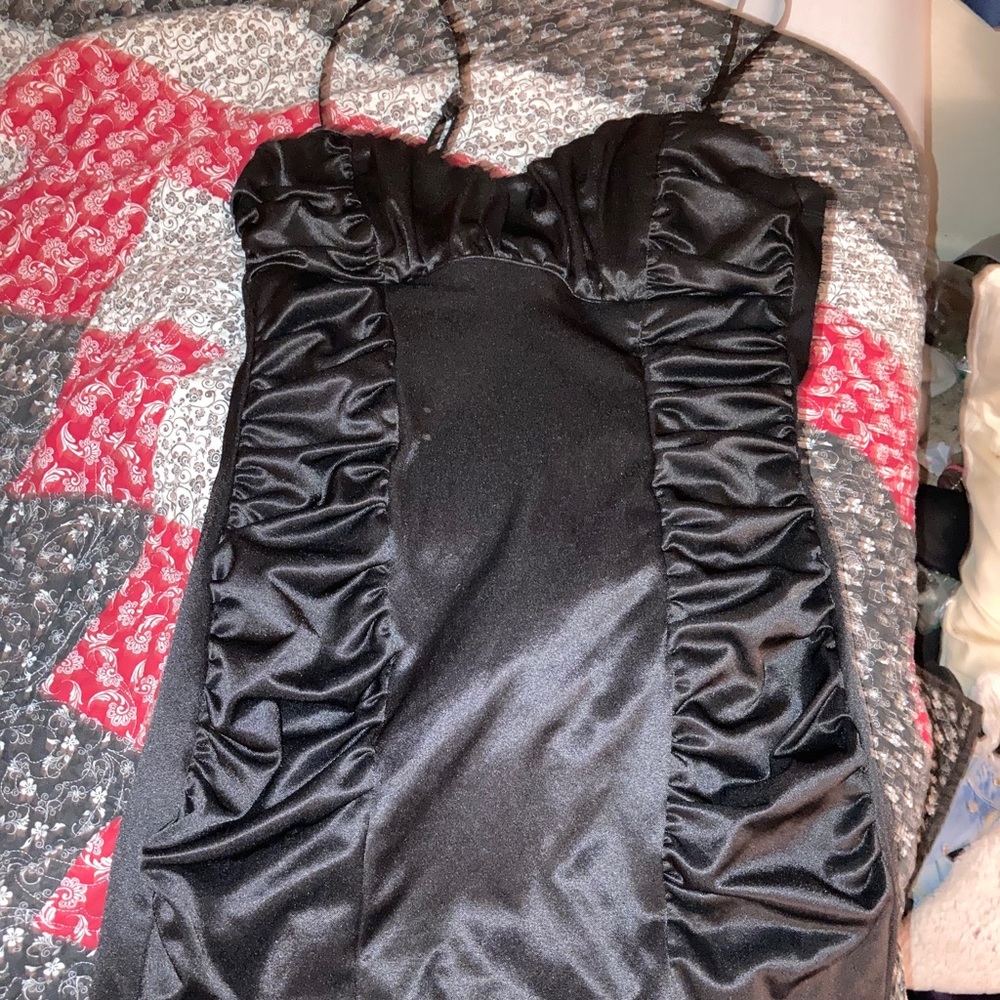 black form fitting dress.